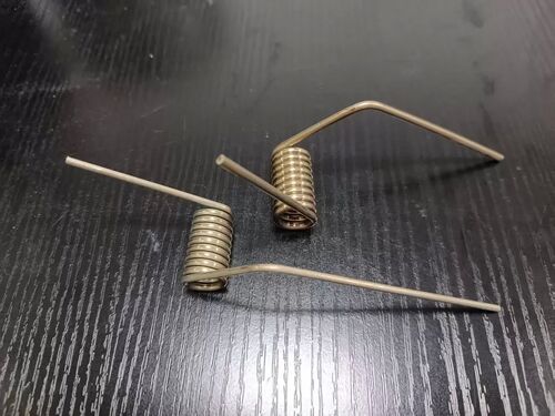 What are the main applications of torsion springs?